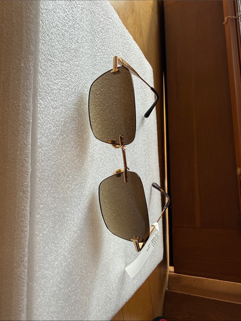 Tom Ford Gold Rimless Sunglasses with Green Lenses